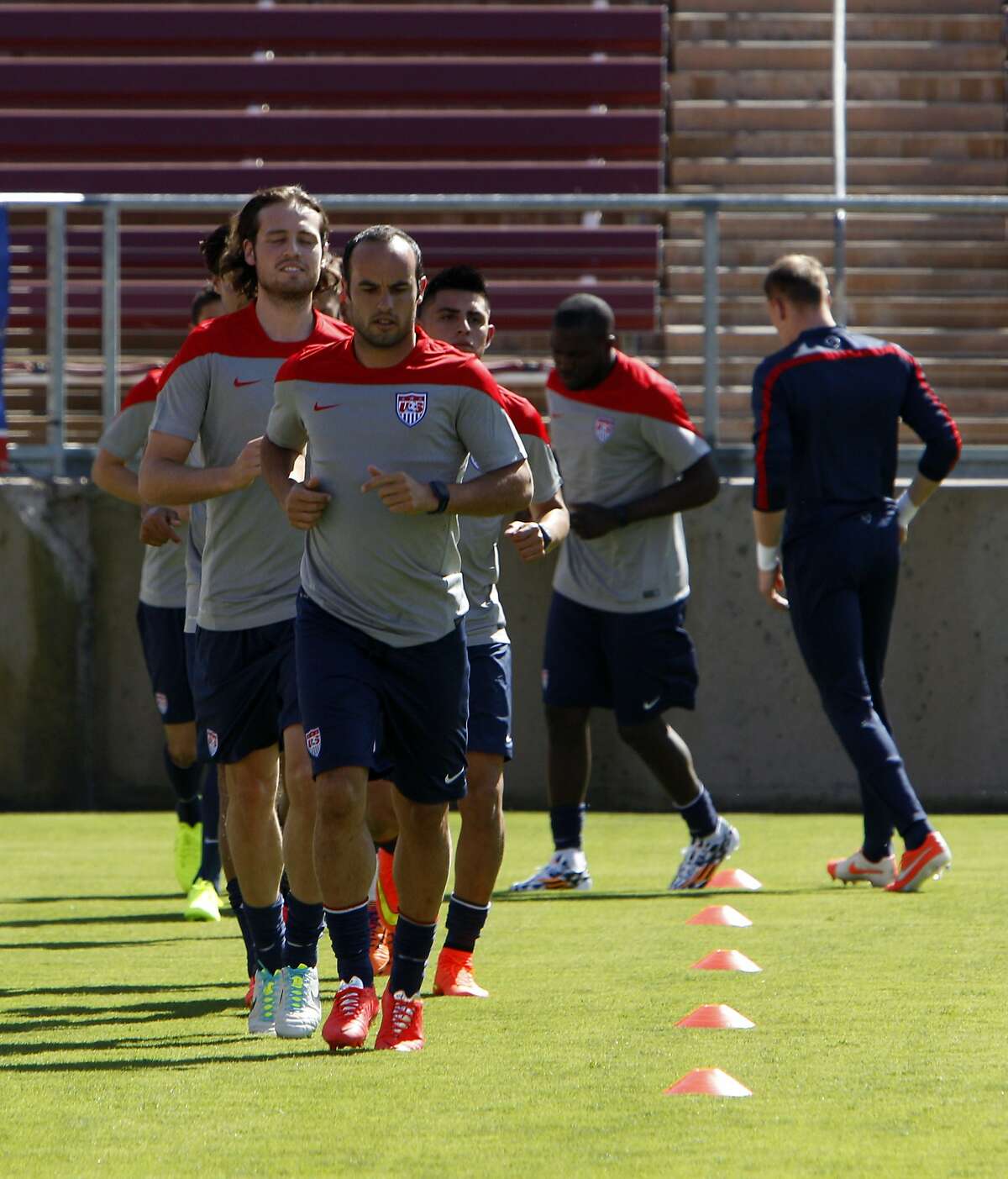 Landon Donovan leads members of the US Men's National Soccer team in drills at Stanford Stadium on Wednesday. The team was introduced during an exhibition practice at Stanford University in Stanford, Calif., on Wednesday, May 14, 2014.