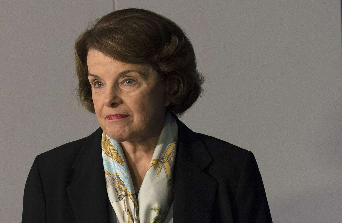 FILE - In this April 3, 2014, file photo, Senate Intelligence Committee Chair Sen. Dianne Feinstein, D-Calif. arrives to make a statement after a closed hearing to examine certain intelligence matters in Washington. The CIA does not give up its secrets easily. Under pressure from a Senate committee to declassify parts of a congressional report on harsh interrogations of suspected terrorists, the CIA is shadowed by its reluctance to open up about its operations and its past. The CIA officials who decide which secrets can be revealed have wrestled with Congress, archivists, journalists, former CIA employees and even a former CIA director. (AP Photo/Molly Riley, File)