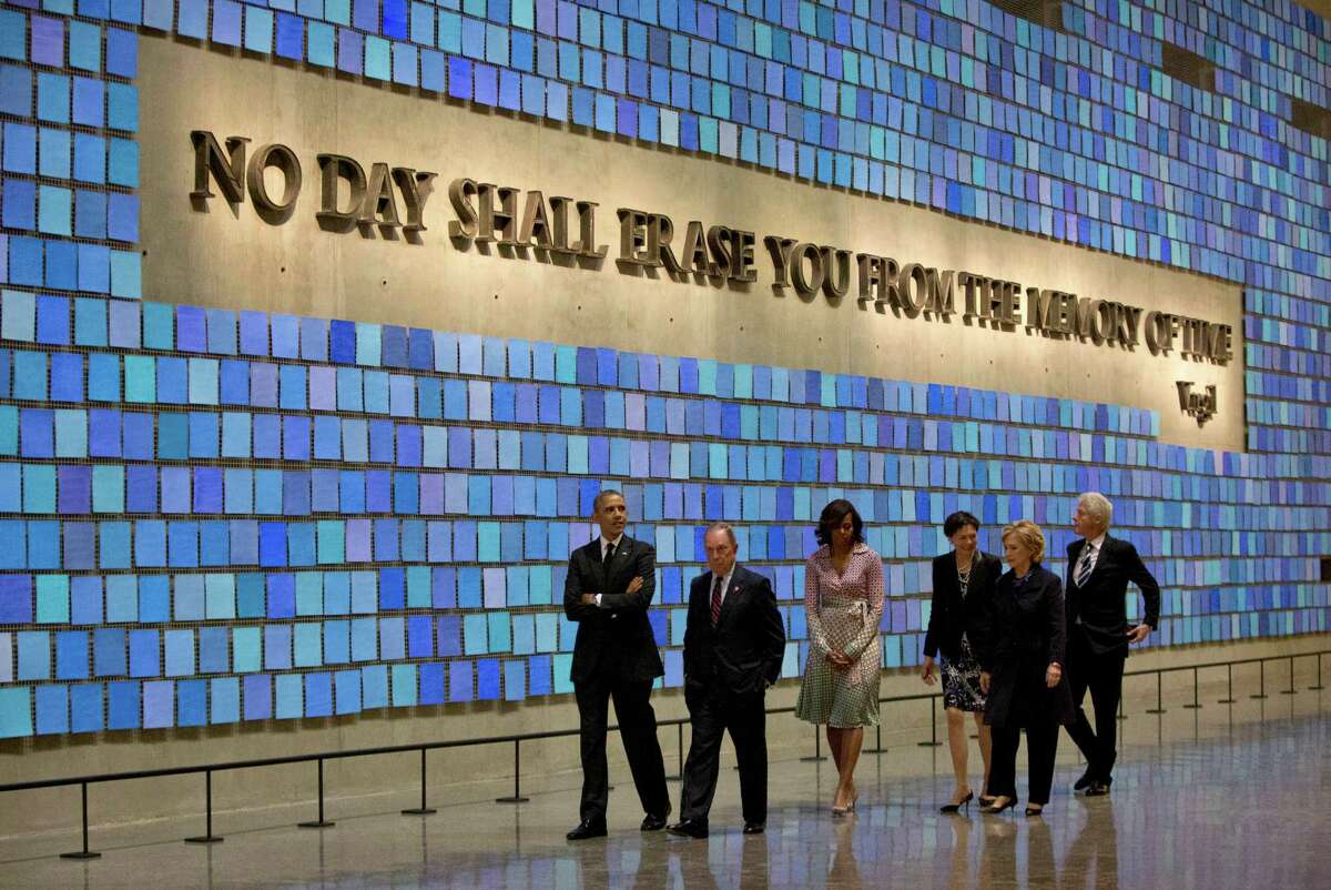 President Barack Obama, first lady Michelle Obama, former New York City Mayor Michael Bloomberg, Hillary Clinton and former President Bill Clinton tour the Memorial Hall Thursday.