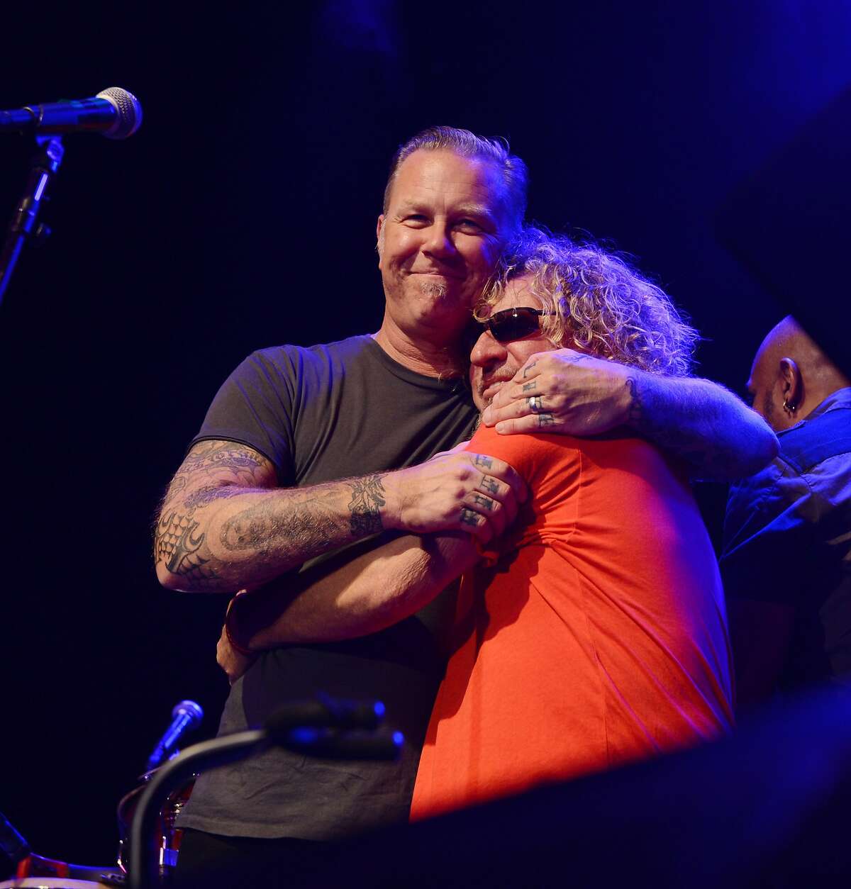 James Hetfield and Sammy Hagar embrace at Acoustic 4 A Cure at the Fillmore Theater on Thursday, May 15, 2014 in San Francisco, Calif.