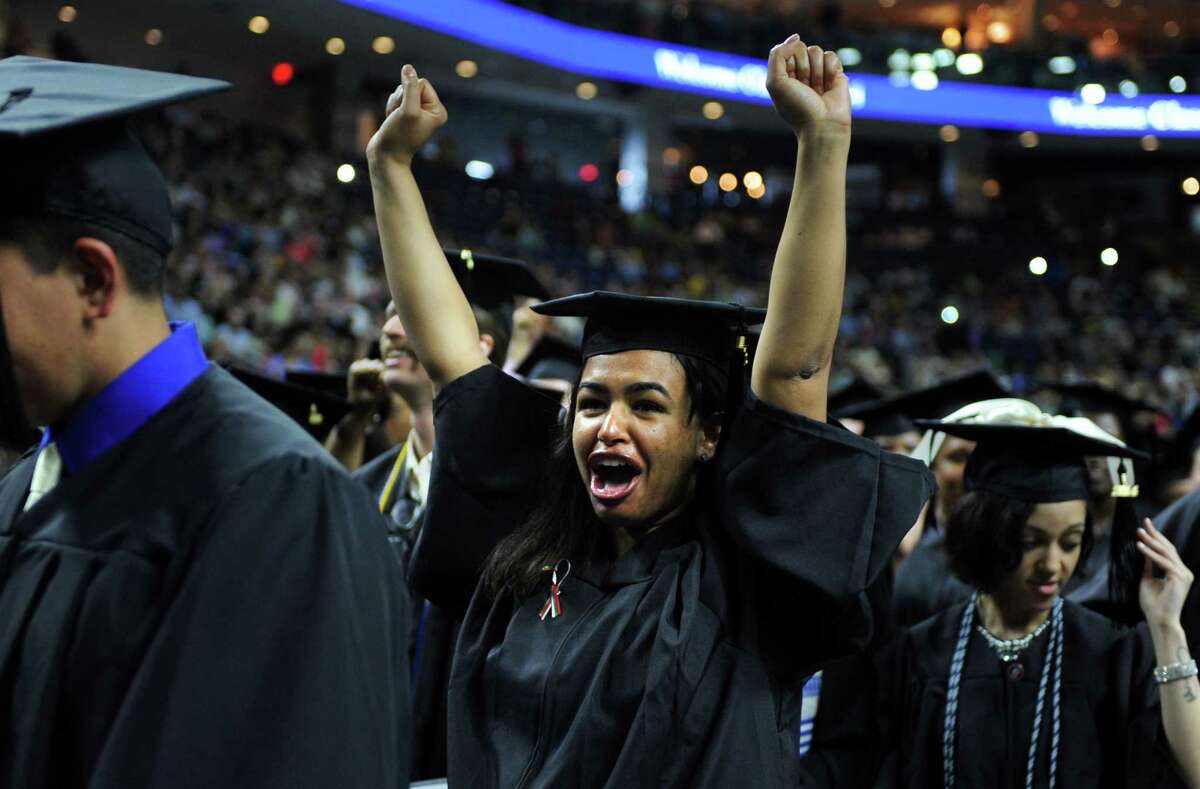 Southern Connecticut State University holds its undergraduate commencement ceremony Friday, May 16, 2014, at the Webster Bank Arena in Bridgeport, Conn.