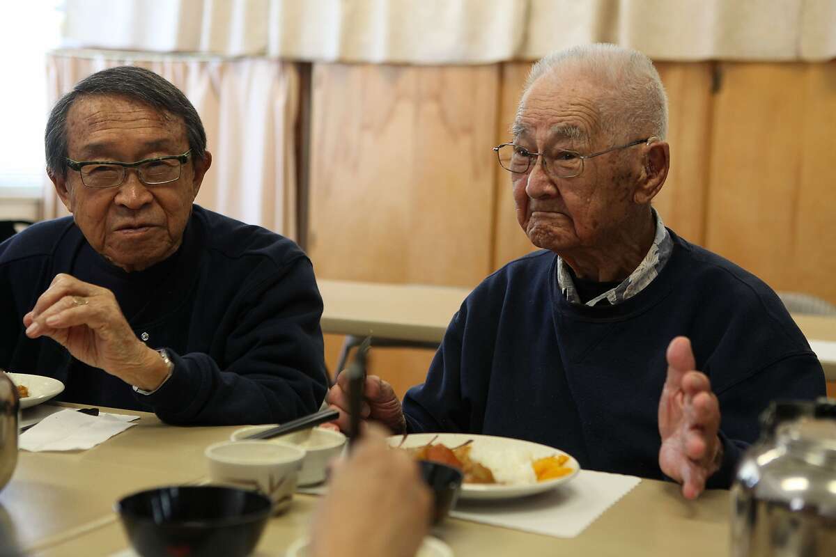 Author George Yoshida (left), 90 years old, and Bill Otani, 99 years old, having lunch at J-Sei in Berkeley, California, on Wednesday, May 30, 2012. George had written a book about swing bands that existed during the Japanese encampments and teaches tai chi and yoga on mondays, and Bill who will be 100 years old on July 1st this year. is a UC Cal graduate of chemistry. Berkeley is considering re-instating funding to J-Sei, a non-profit senior center for Japanese Americans.