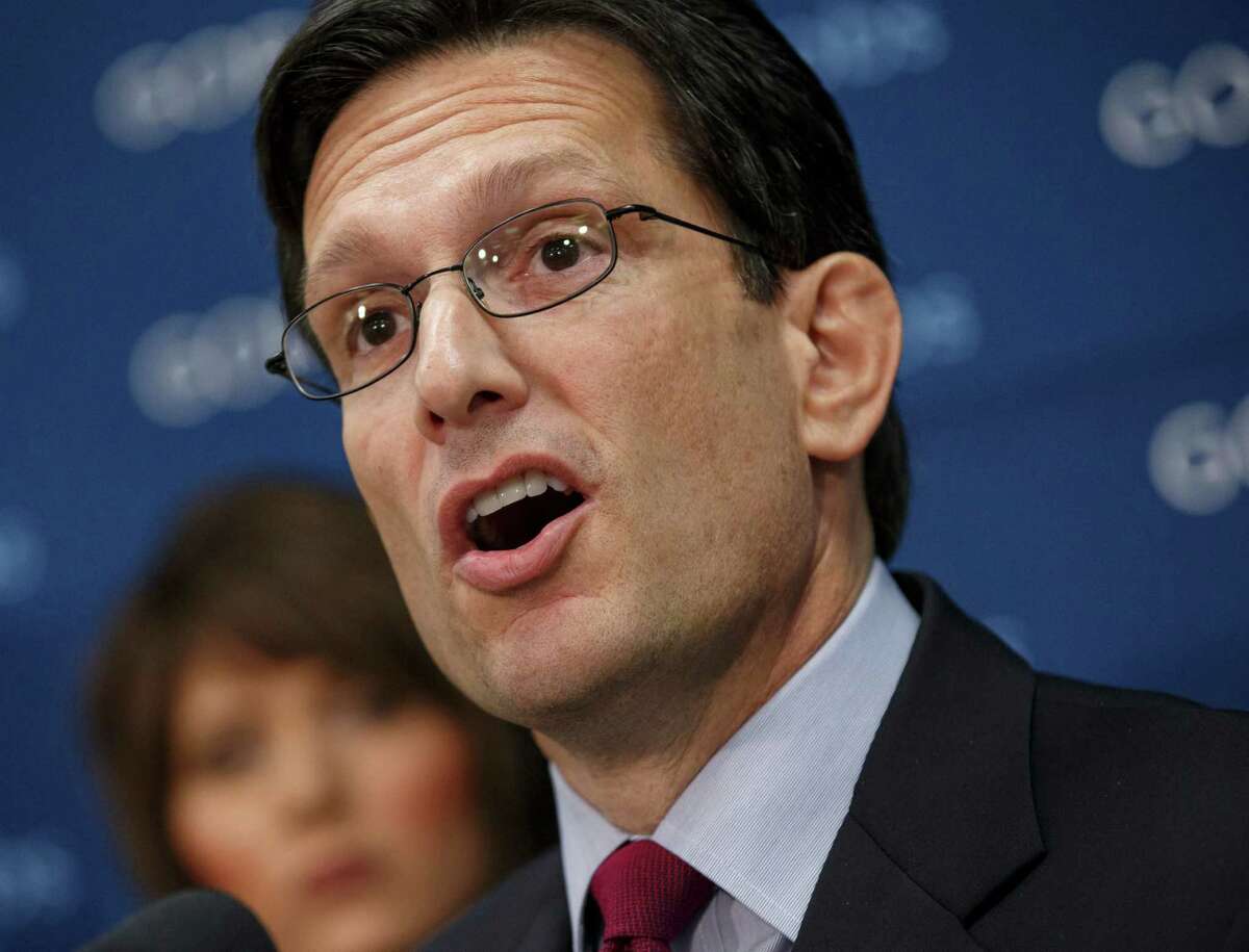 FILE - This Jan. 14, 2014 file photo shows House Majority Leader Eric Cantor of Va. speaking on Capitol Hill in Washington. A spokesman for Cantor says he'll block a vote next week on legislation giving a path to citizenship to people living here illegally who serve in the military. Friday's announcement from Cantor comes after a Republican congressman from California announced plans to try to bring the measure to a vote as an amendment to the annual defense bill. (AP Photo/J. Scott Applewhite, File)