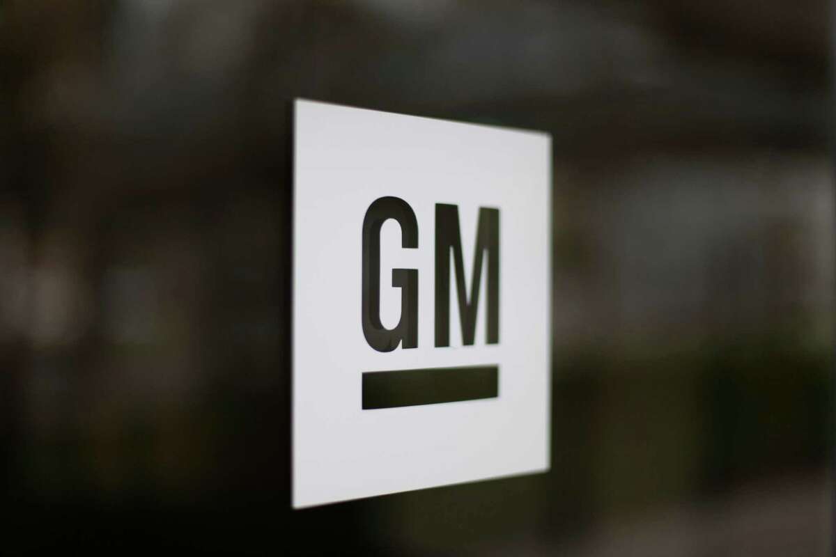 This Friday, May 16 2014 photo shows the General Motors logo at the company's world headquarters in Detroit. U.S. safety regulators fined General Motors a record $35 million Friday for taking at least a decade to disclose defects with ignition switches in small cars that are now linked to at least 13 deaths. (AP Photo/Paul Sancya)