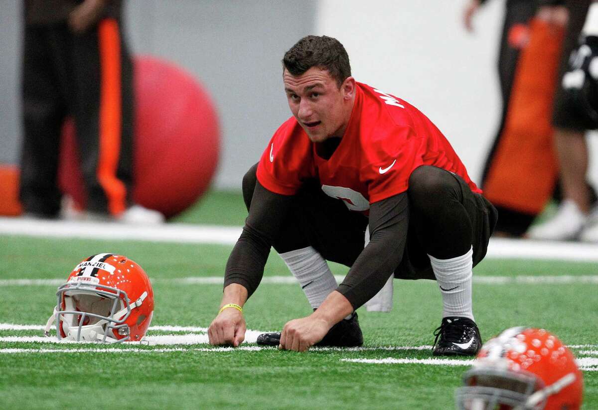 First-round draft pick Johnny Manziel took part in his first workout as a member of the Browns on Saturday during the team's rookie minicamp.