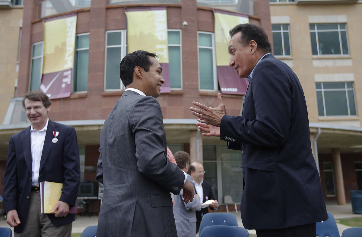 Mayor Julián Castro and Henry Cisneros, who was mayor in the 1980s and went on to be secretary of Housing and Urban development during the Clinton administration, celebrate the opening of a SA2020 project in 2011.