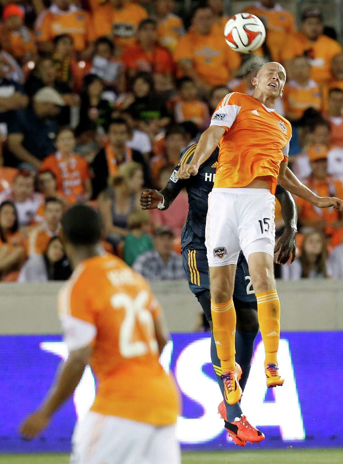 Dynamo forward Mark Sherrod wins the aerial battle against the Galaxy in the second half Saturday as the Orange prevailed 1-0 at BBVA Compass Stadium.