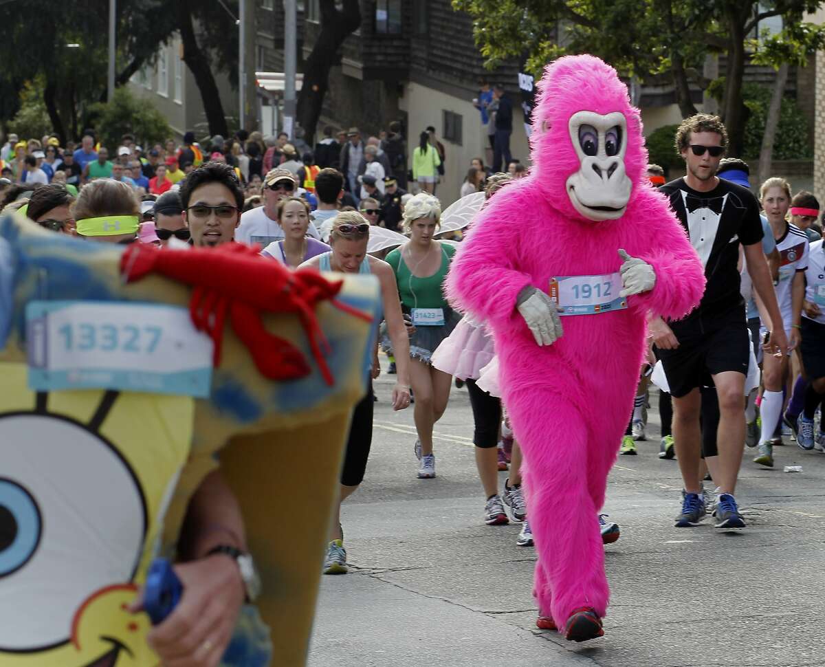 The pink gorilla, a regular at the event, stood out from the crowd. The annual Bay to Breakers event in San Francisco, Calif. attracted thousands of runners and revelers as they made their way up the Hayes Street hill Sunday May 18, 2014.