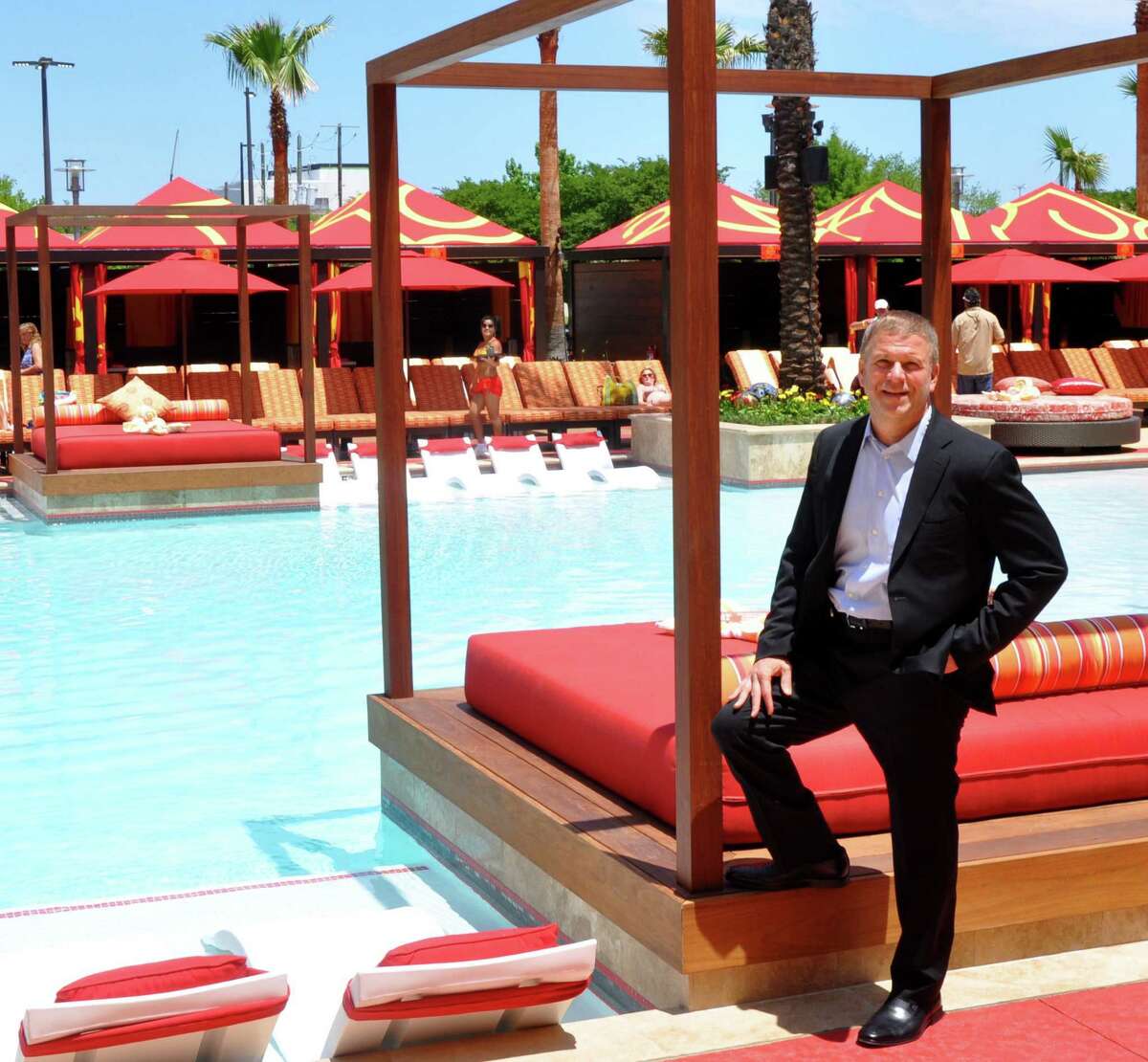 Billionaire Tilman Fertitta's Golden Nugget casino in Biloxi, Mississippi features an opulent pool area with a sunken bar, sunbathing couches the size of beds and a blackjack station on the patio.