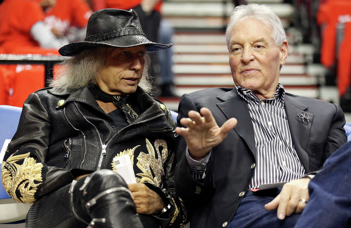 NBA super fan Jimmy Goldstein (left) talks with Spurs owner Peter Holt before Game 3 in the Western Conference semifinals between the San Antonio Spurs and the Portland Trail Blazers Saturday May 10, 2014 at the Moda Center in Portland, OR.