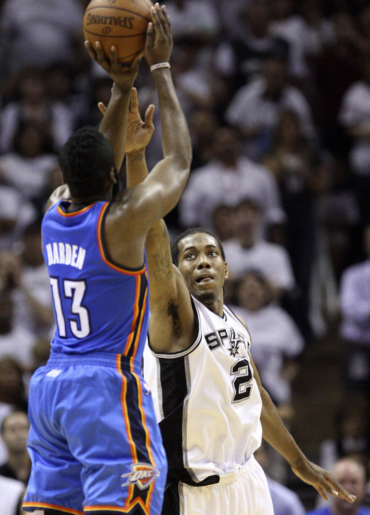 Kawhi Leonard (right) has moved on from the 2012 Western Conference finals in which James Harden provided a 3-point dagger for OKC in Game 5. Harden has also moved on — to Houston.