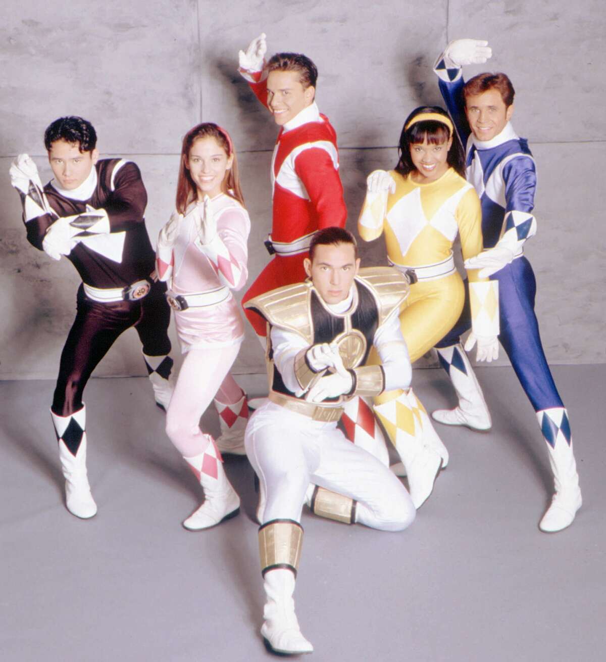 The 'Mighty Morphin Power Rangers' television show featured, left to right, Johnny Yong Bosch (Black Ranger), Amy Jo Johnson (Pink Ranger), Steve Cardenas (Red Ranger), Jason Frank (White Ranger), Karan Ashley (Yellow Ranger) and David Yost (Blue Ranger).