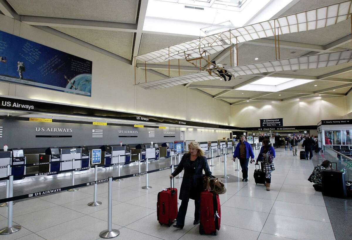 19. Charlotte/Douglas International Airport, Charlotte, North Carolina 47 guns collected in the past two years (26 in 2012 and 21 in 2013)PHOTO: A traveler walks to security at Charlotte-Douglas International Airport on Jan. 16, 2009, in Charlotte, North Carolina.