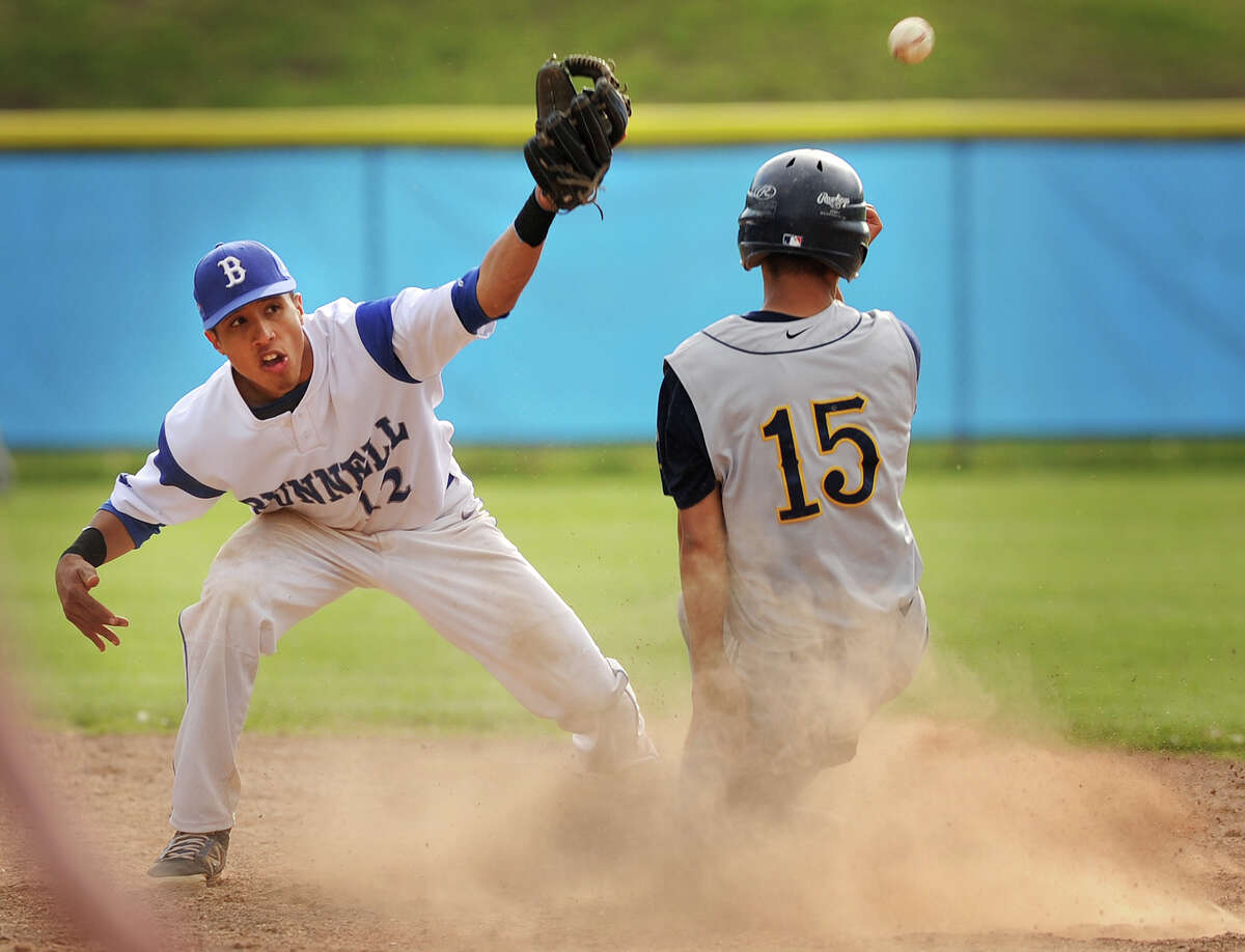 Weston's Asher Lee-Tyson steals second base as the throw hops past Bunnell's Aaron Rios in the 5th inning of their boys baseball game at Bunnell High School in Stratford, Conn. on Monday, May 19, 2014. Lee-Tyson was stranded on third in the inning and did not score.