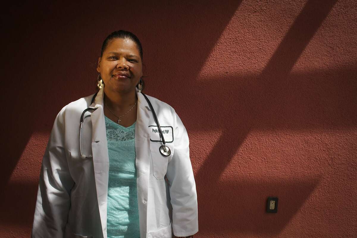 Phyllis Howard, a nurse practitioner, poses for a portrait at the Contra Costa County family practice clinic in Richmond on May 16th 2014. Howard has also been participating in a UCSF trial for women with early stage breast cancer.