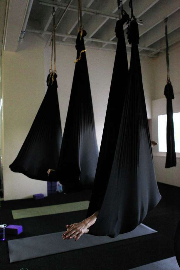 Aerial Yoga Houston helps you fly high, stretch long Houston Chronicle
