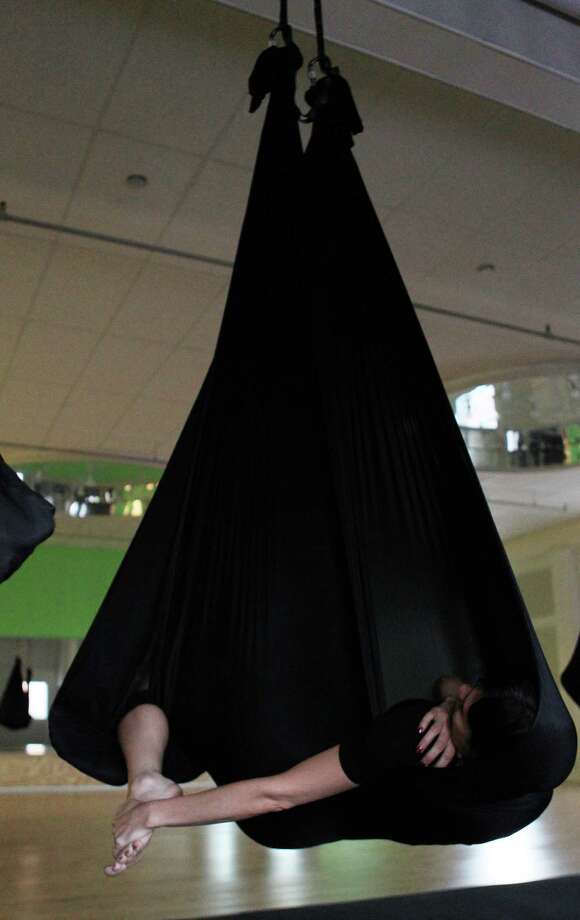Aerial Yoga Houston helps you fly high, stretch long Houston Chronicle