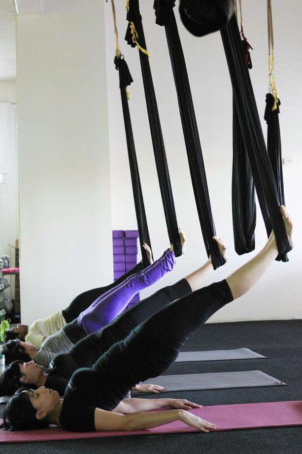 Aerial Yoga Houston helps you fly high, stretch long Houston Chronicle