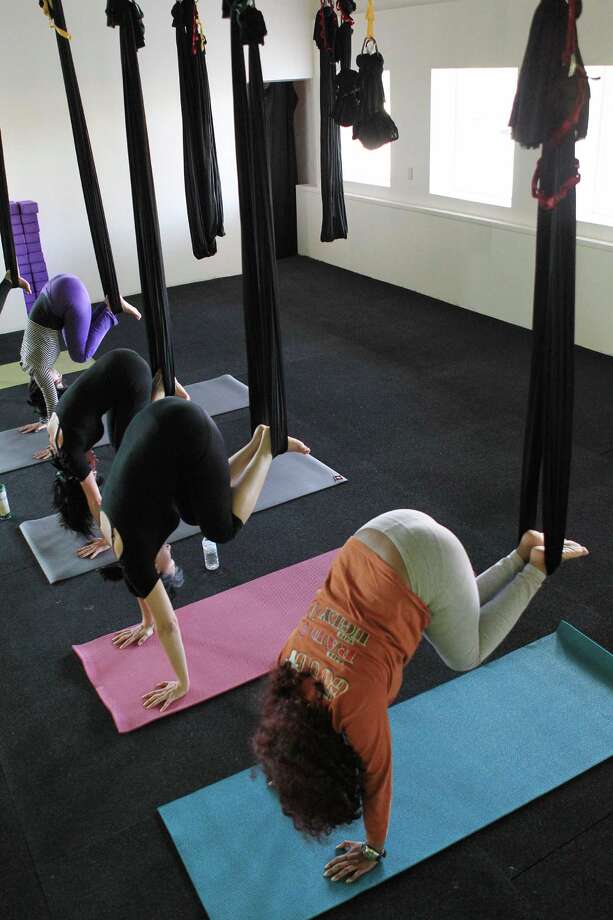 Aerial Yoga Houston helps you fly high, stretch long Houston Chronicle