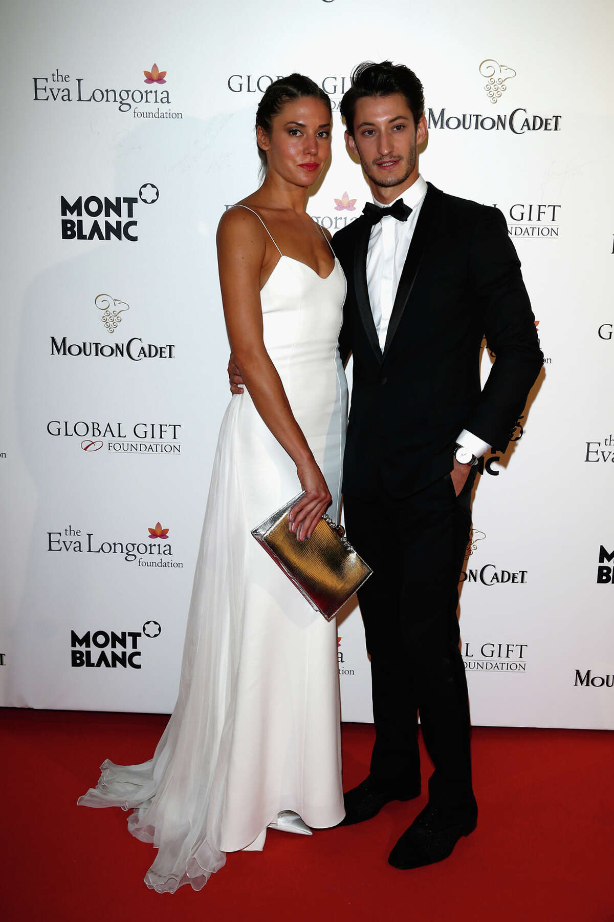 Pierre Niney (right) attends the Global Gift Gala hosted by Eva Longoria during the 67th Annual Cannes Film Festival on May 16, 2014 in Cannes, France.