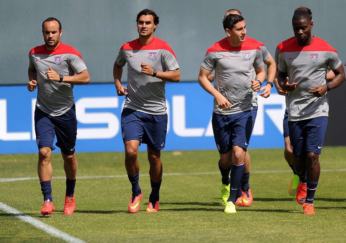 Members of The United States Men's National Soccer Team (L-R) Landon Donovan, Chris Wondolowski, Alejandro Bedoya, and Maurice Edu practice at Stanford Stadium in Stanford, California on May 16, 2014. The Brazil World Cup opens on June 12, 2014. AFP PHOTO/JOSH EDELSONJosh Edelson/AFP/Getty Images