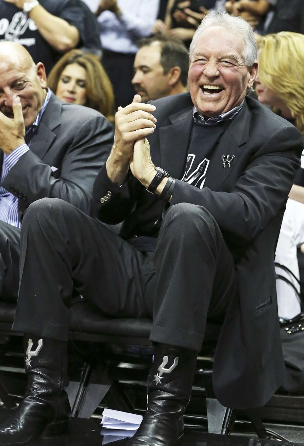 Peter Holt enjoys the second half as the Spurs play the Thunder in the opener of the NBA Western Conference finals at the AT&T Center on May 19, 2014.