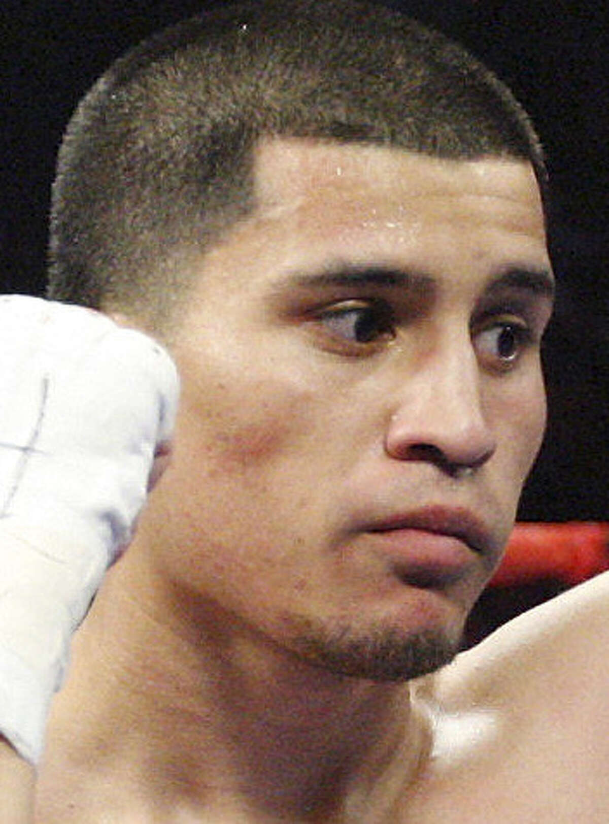 S.A. boxer Lopez wins in return to ring
