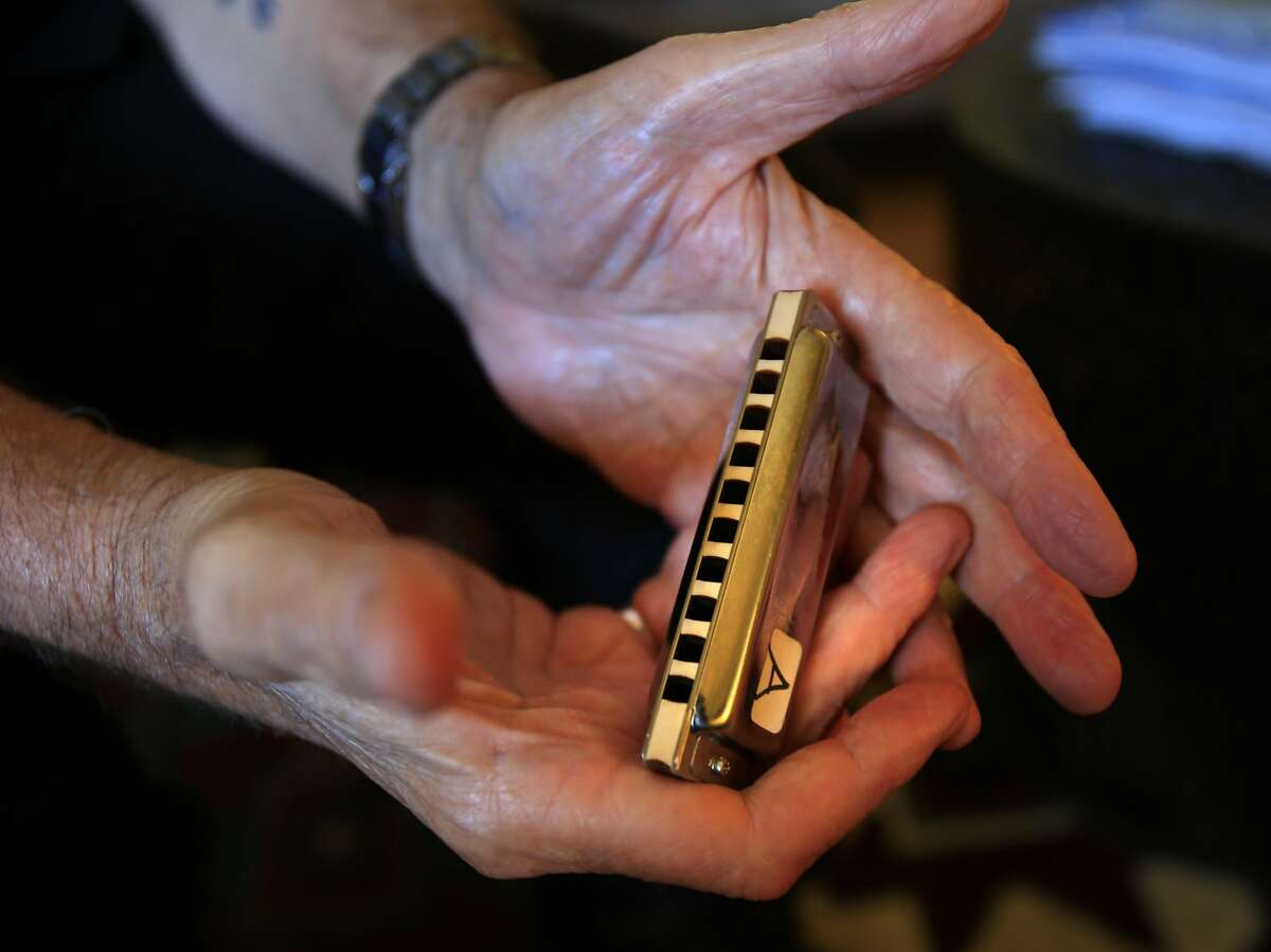 Charlie Musselwhite holds one of his Seydel harmonicas at his home Thursday May 22, 2014. Blues great Charlie Musselwhite is anchoring the upcoming Healdsburg Jazz Festival.