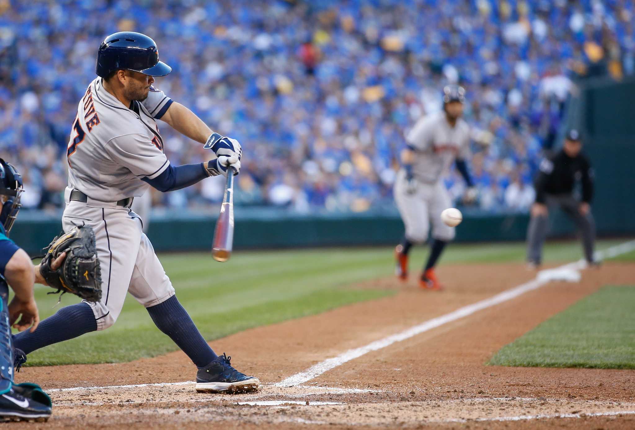 Morgan Ensberg of the Houston Astros attempts to field a groud