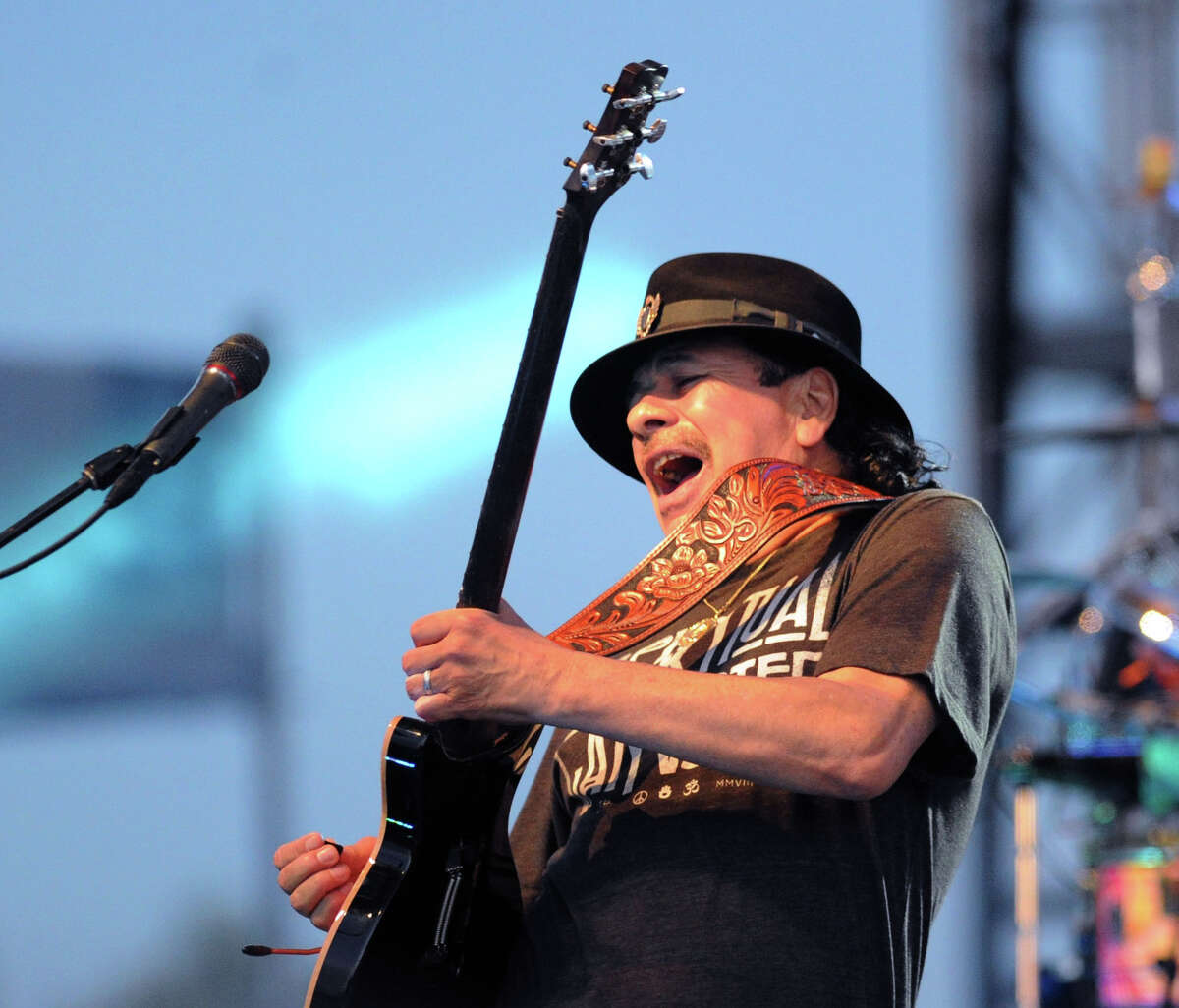 Carlos Santana performs during the Greenwich Town Party at Roger Sherman Baldwin Park, Greenwich, Conn., Saturday, May 24, 2014.
