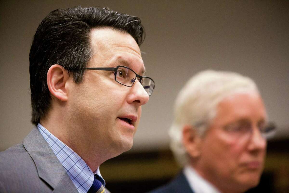 Former Seattle lawyer Danford Grant, left, is pictured at his May 19, 2014, sentencing hearing in King County Superior Court.