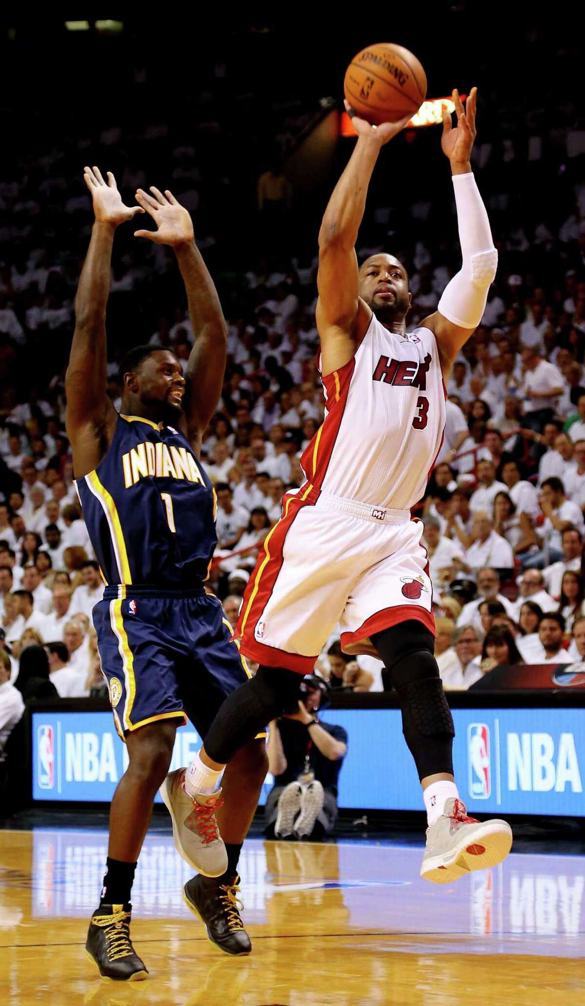 The Heat's Dwyane Wade shoots during Game 4 of the Eastern Conference finals in Miami as the Pacers' Lance Stephenson defends. Wade finished with 15 points, while Stephenson was held to nine.