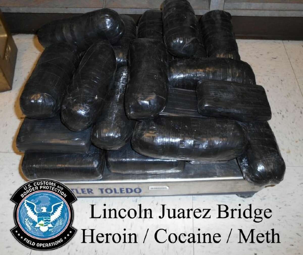 April 16, 2014:  A Pearland woman was caught at the U.S. and Mexico border with just over $1 million in concealed narcotics, according to U.S. Customs and Border Protection officials. Officers found 19 pounds of methamphetamine, 12 pounds of heroin and another 10 pounds in cocaine inside the car being driven by the woman.