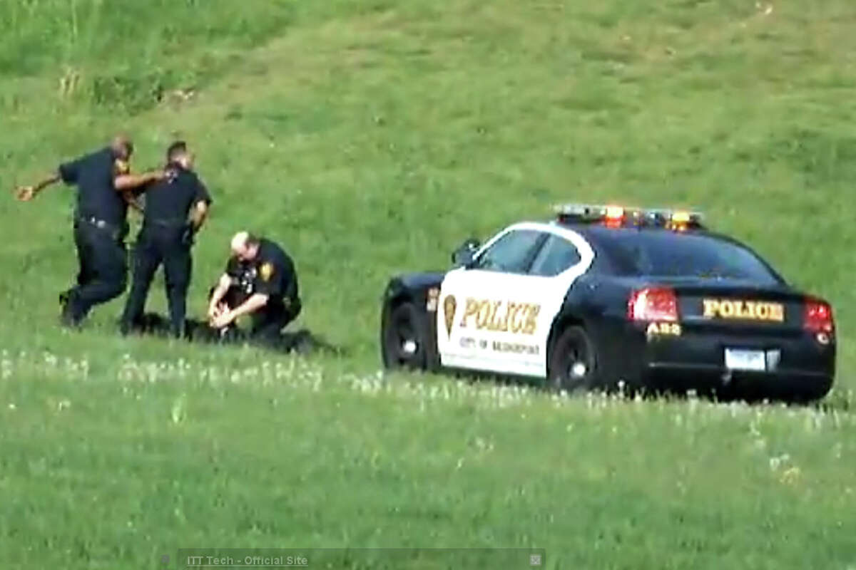 A screen grab from a video, posted on YouTube on Jan. 6, 2013, showing three Bridgeport, Conn. police officers kicking a man in Beardsley Park on May 20, 2011. On Tuesday, May 27, 2014 city officials said they agreed to settle the man's civil rights lawsuit against the Police Department, paying him $198,000.