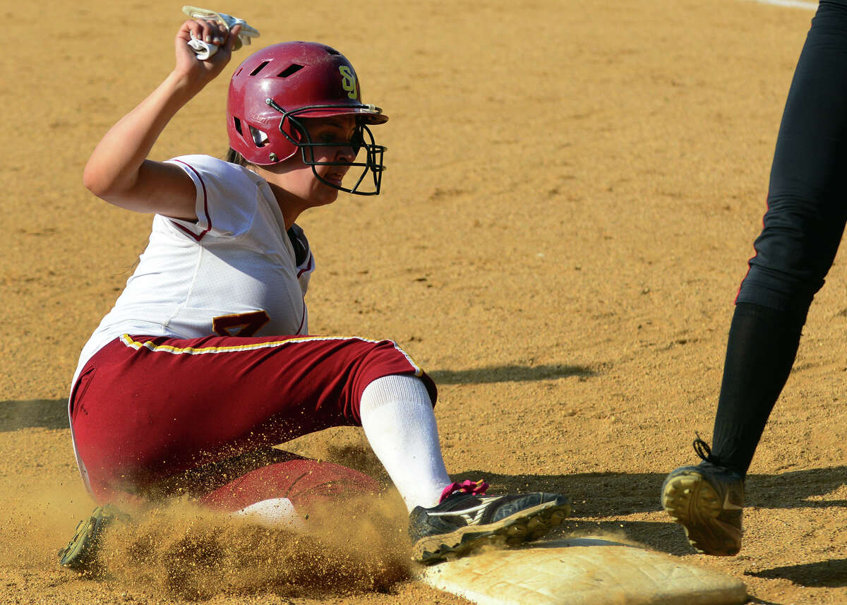 St. Joseph's Amy Chacho slides into third, during softball action against New Canaan in Trumbull, Conn. on Tuesday May 27, 2014.