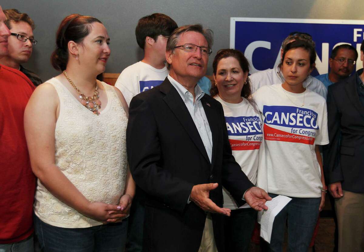 Former U.S. Rep. Francisco "Quico" Canseco, R-San Antonio (center), addresses his supporters at his campaign headquarters after conceding the District 23 run-off race to fellow Republican William Hurd on Tuesday, May 27, 2014.