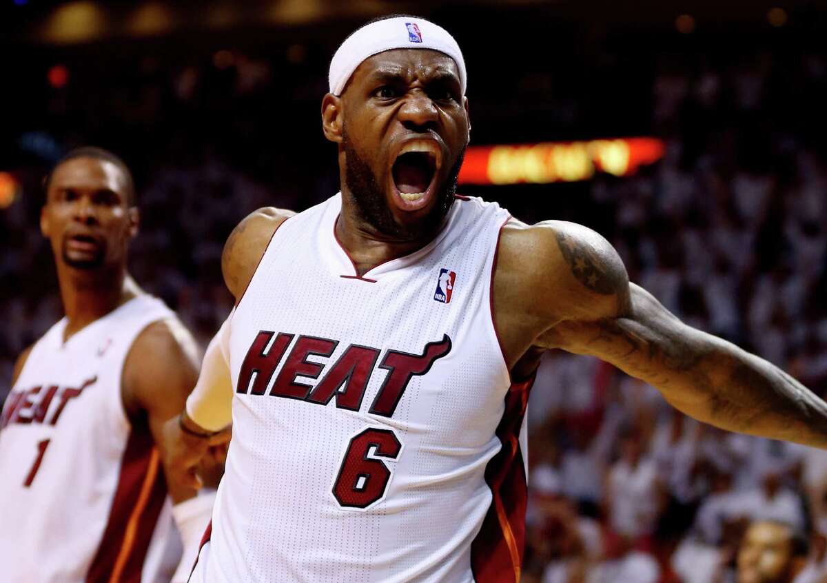 MIAMI, FL - MAY 26: LeBron James #6 of the Miami Heat reacts after a basket against the Indiana Pacers during Game Four of the Eastern Conference Finals of the 2014 NBA Playoffs at American Airlines Arena on May 26, 2014 in Miami, Florida. NOTE TO USER: User expressly acknowledges and agrees that, by downloading and or using this photograph, User is consenting to the terms and conditions of the Getty Images License Agreement. (Photo by Mike Ehrmann/Getty Images)