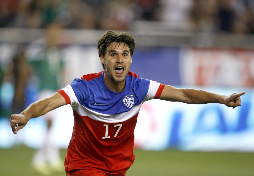 The FIFA captain's armband and tattooed arm of Clint Dempsey of USA