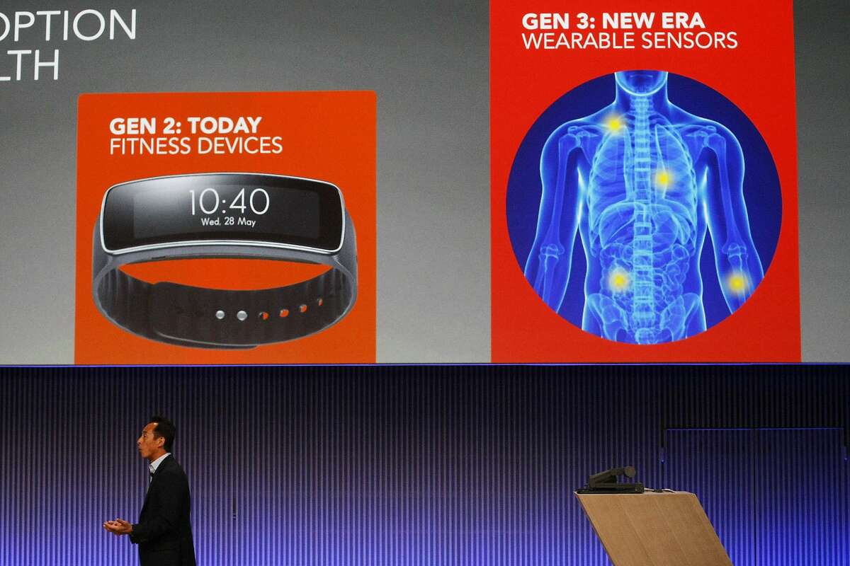 Samsung President and Chief Strategy Officer Young Sohn unveils the new Simband at the SF JAZZ Center in San Francisco, Calif. on Wednesday, May 28, 2014. Samsung announced a wristband that would enable users to monitor their health more closely.