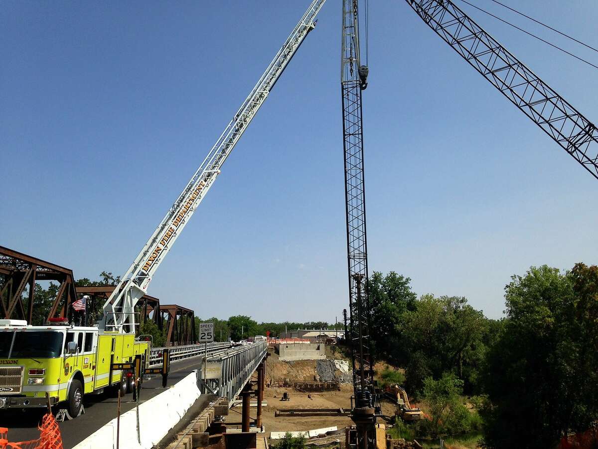 Two construction workers fell 80 feet from the yellow basket of this crane and died early on Friday, May 30, 2014, in Winters (Yolo County).