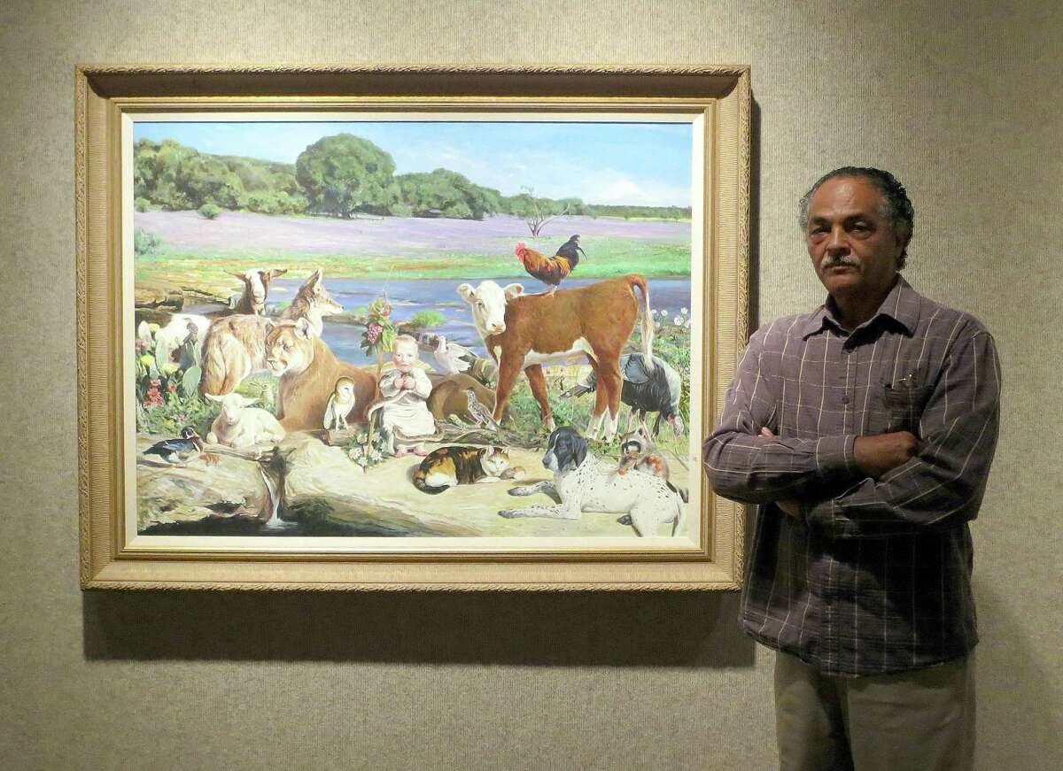 Kermit Oliver, standing before his painting "Child of the Branch," says he was never comfortable in the contemporary art scene. He work hangs in museums and galleries worldwide.