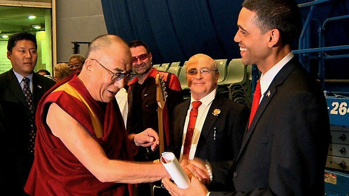 Barack Obama impersonator Luis Ortiz meets the real Dalai Lama in "Bronx Obama," screening at the 2014 DocFest.