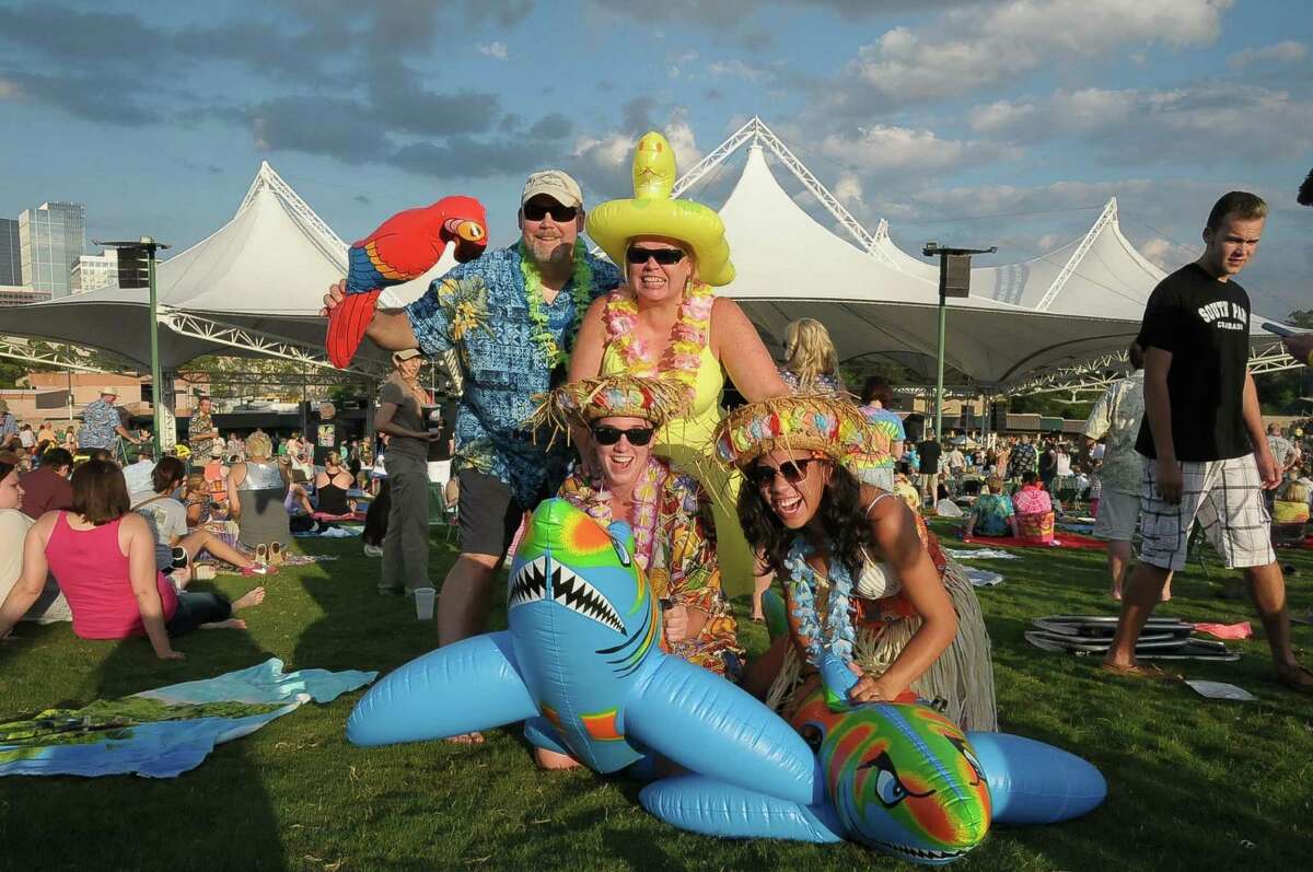Jimmy Buffett fans dress up in their finest for his show at Cynthia Woods Mitchell Pavilion in The Woodlands Thursday May 29, 2014.