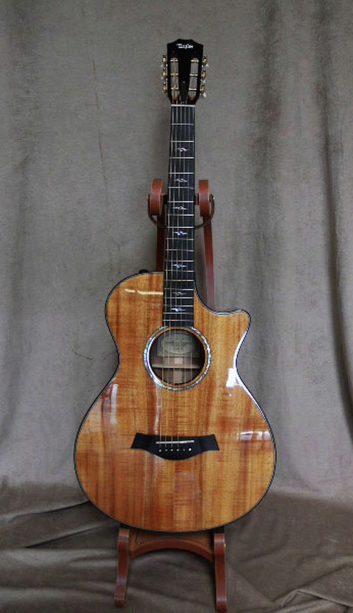 Michael Brown's collectible guitars bring in more than 100,000 at auction