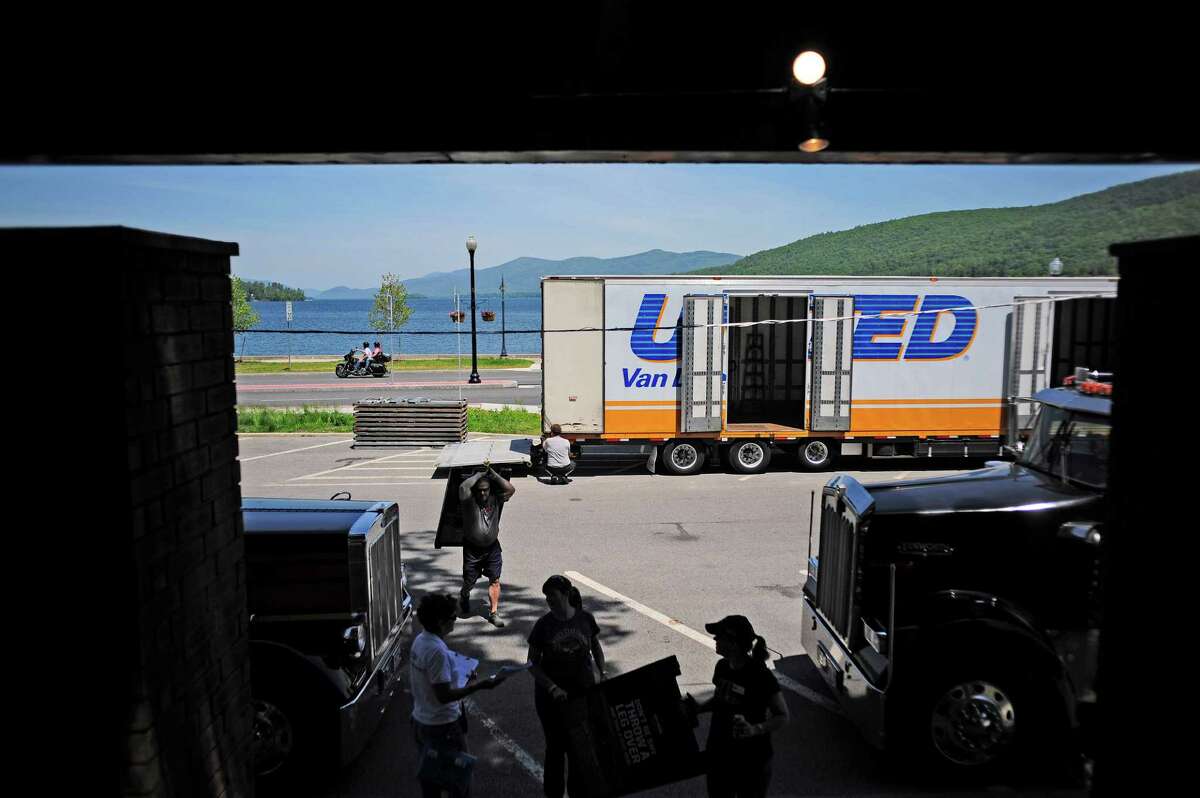 Vendors begin the process of setting up for the start of Americade on Monday, June 2, 2014, in Lake George, N.Y. Americade is the worldas largest multi-brand motorcycle touring rally. (Paul Buckowski / Times Union)