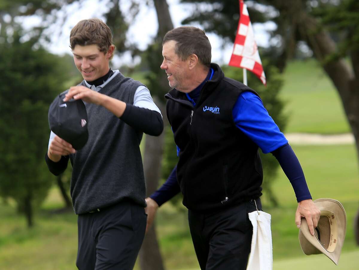 Maverick McNealy (left) and his father Scott, who worked as his caddy, smiled as they walked away from the 18th hole at the Olympic Club. Qualifying rounds for the U.S. Open were held at The Olympic Club and Lake Merced.