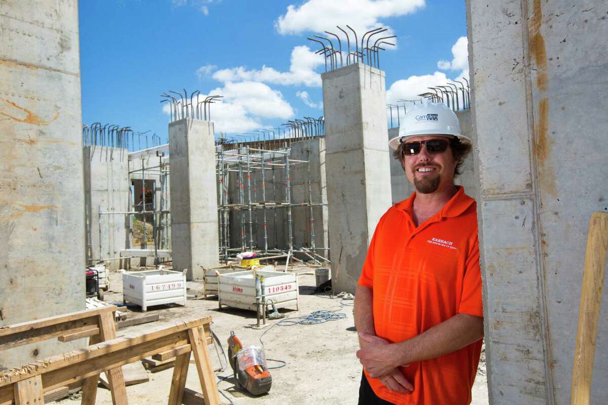 Eric Warner Karbach Brewing brewmaster stands by the construction site where the new brewing tanks will be placed. The project, which will also include a restaurant, will give Karbach immediate capacity to produce 60,000 barrels annually. Monday, June 2, 2014, in Houston. ( Marie D. De Jesus / Houston Chronicle )