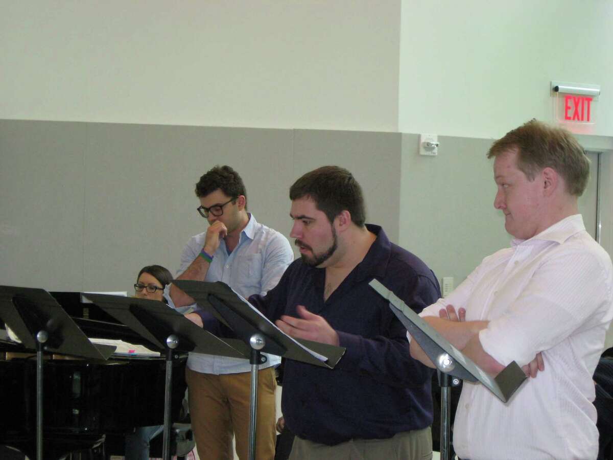 Opera Saratoga young artists James Judd, George Ross Somerville, Alex Soare, and pianist Sara Chiesa rehearse for the Roscoe Workshop. (Photo courtesy Curtis Tucker)
