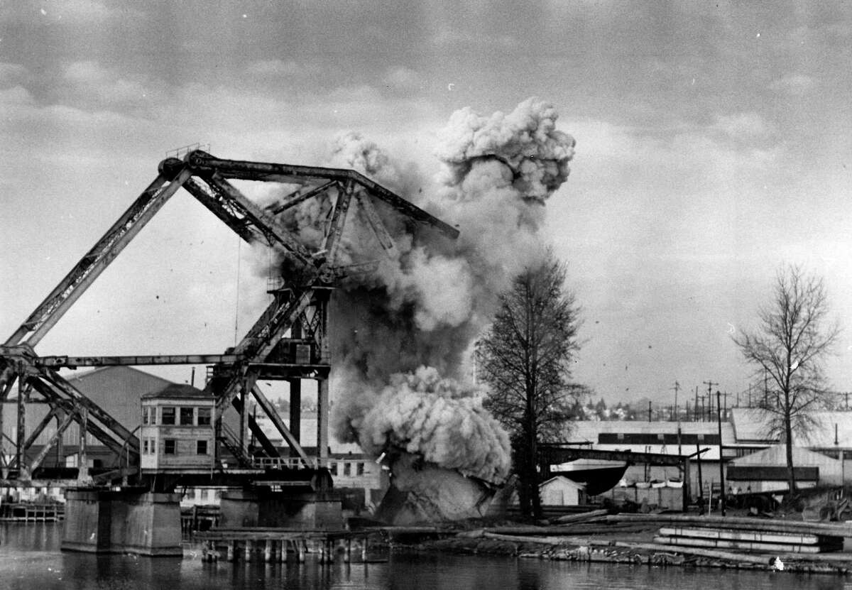 December 10, 1976 - Ten pounds of plastic explosives put an end to the 61-year-old steel railroad drawbridge over Salmon Bay in the Lake Washington Ship Canal.