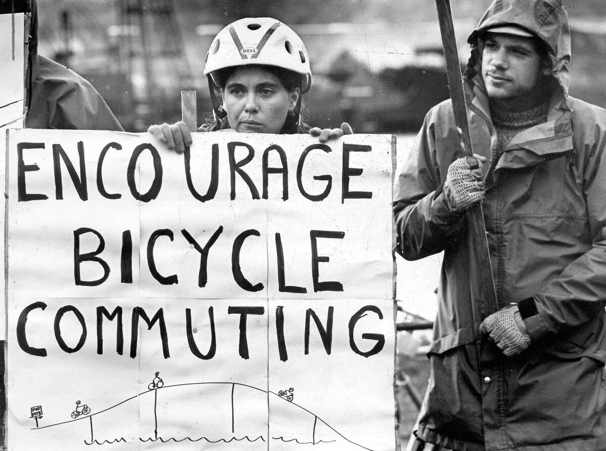 November 1980 - Joanne Murray encourages support of bikeways on the West Seattle bridge. Photo by Kurt Smith.